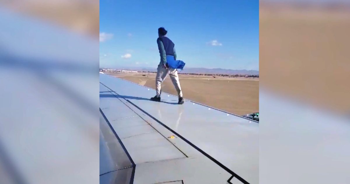 Excuse me I get out, opens the emergency door and clings to the wing. It didn't end well.