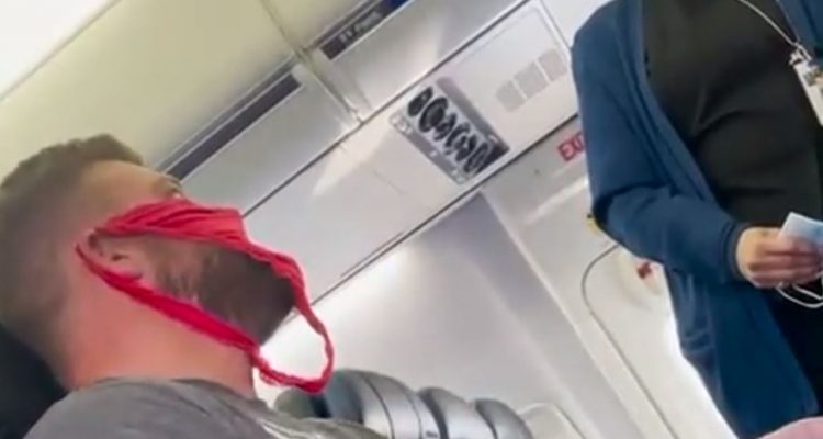 Passenger kicked off flight, had thong as mask: VIDEO