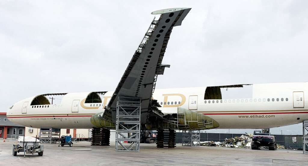 etihad-transforms-777-in-keychain-airplane-demolished