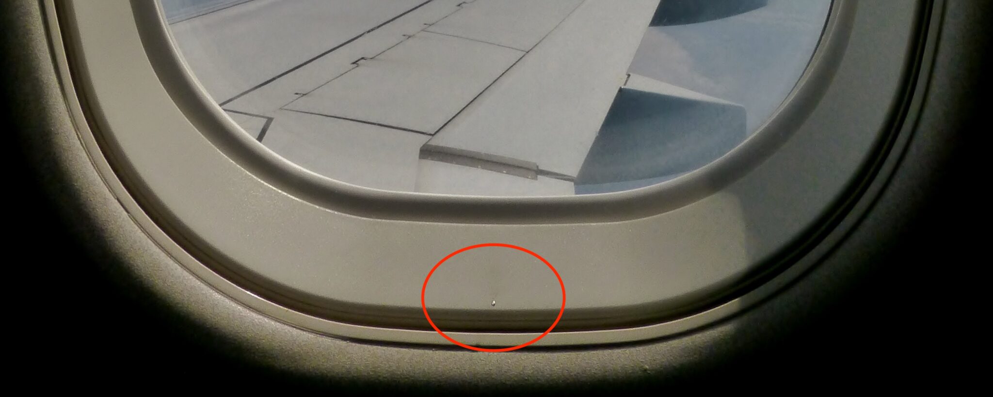 airplane cabin window hole