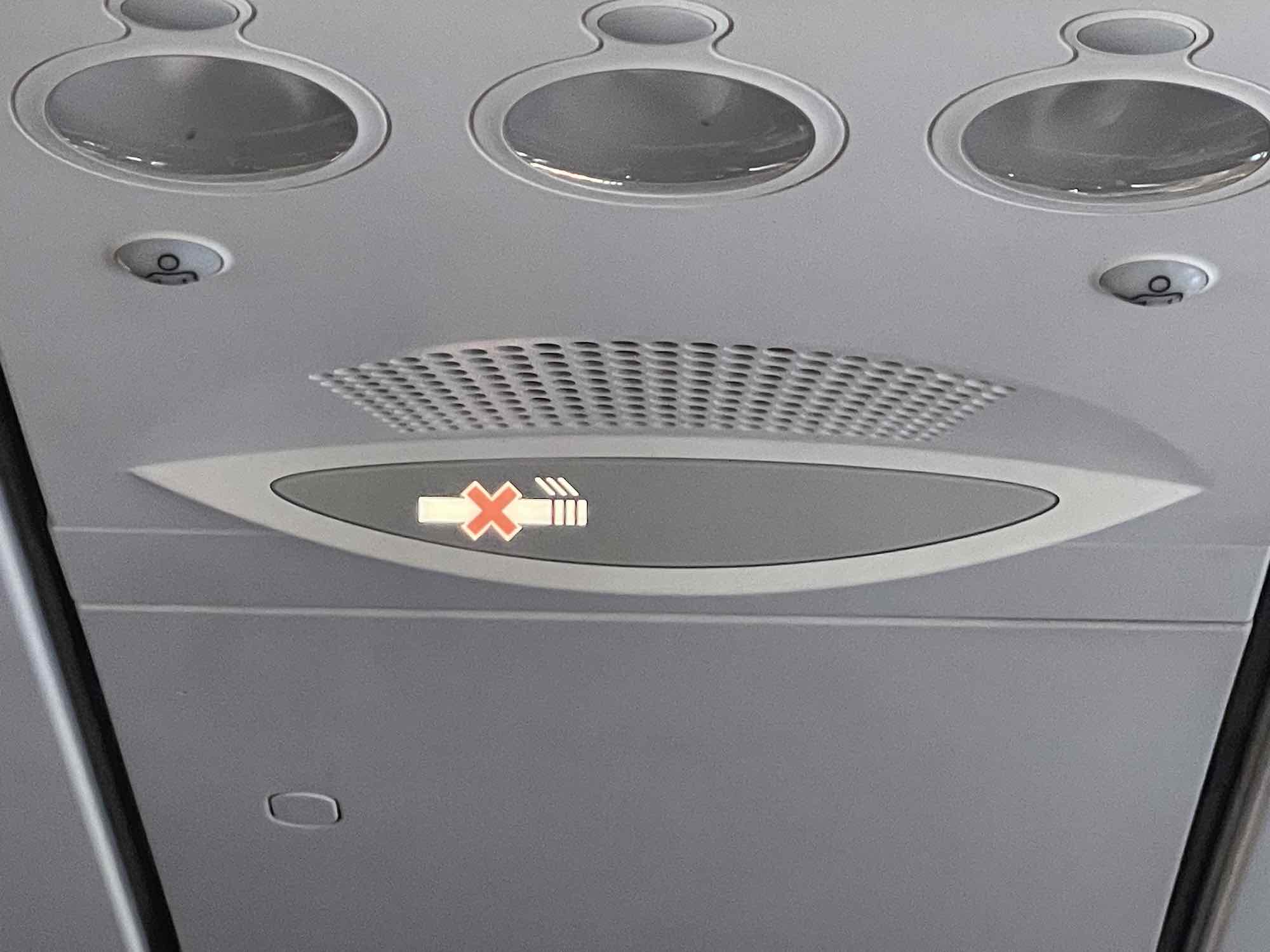 When you could smoke on the plane... and what you risk if you try to do it today