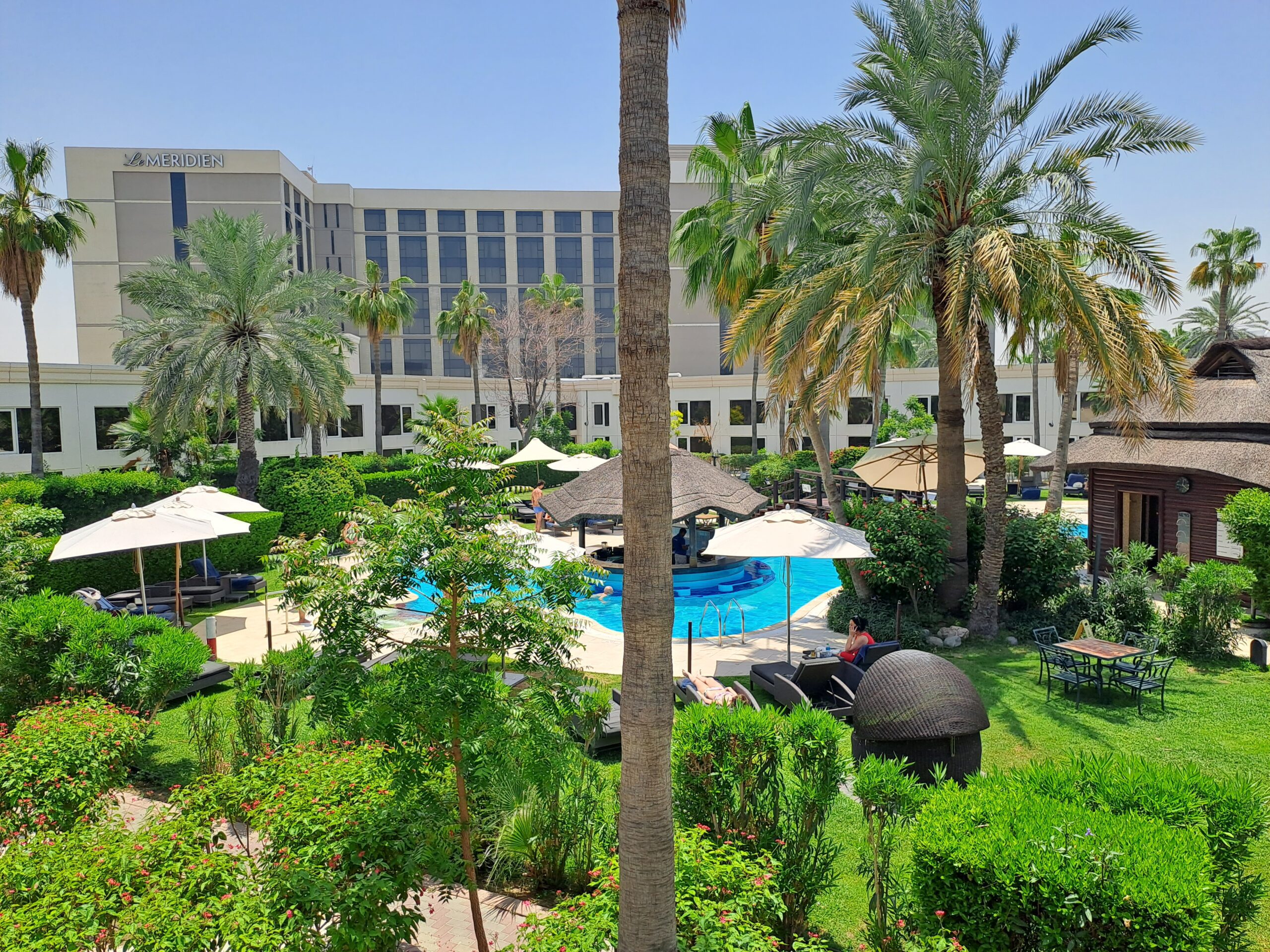An oasis of palm trees, gardens and pools 100m from the Emirates terminal: review Le Meridien Dubai